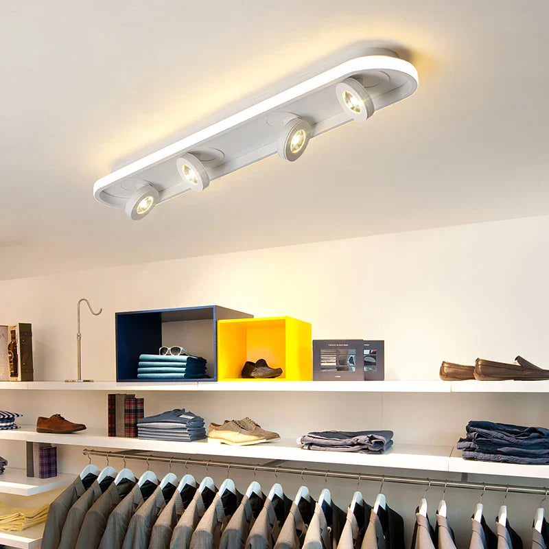 Adjustable Ceiling Spot Light for Living Room Bedroom, by Econiko. Ideal for Track Lighting in Cloth Shop.